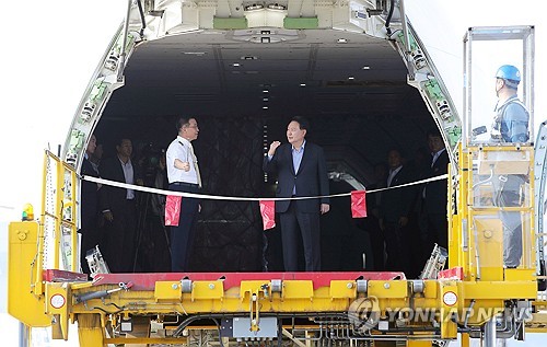Yoon on board cargo plane