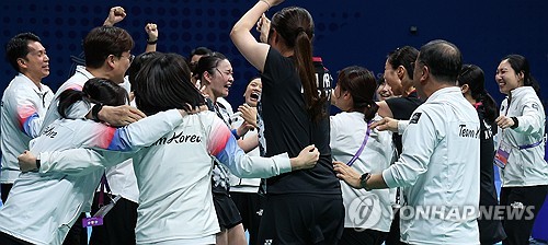 Women's badminton team wins gold