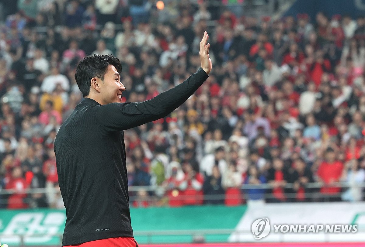 South Korean captain Son Heung-min acknowledges supporters after his team's 4-0 win over Tunisia in a men's friendly football match at Seoul World Cup Stadium in Seoul on Oct. 13, 2023. (Yonhap)