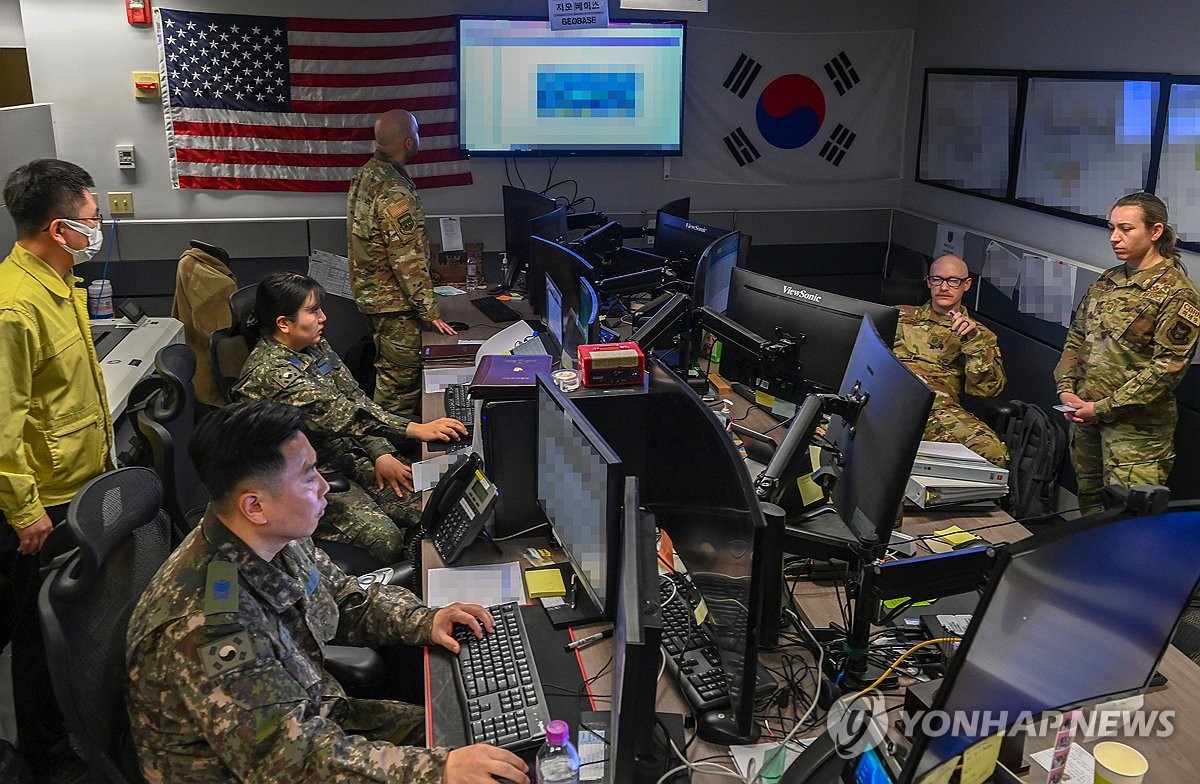 South Korean and U.S. air force personnel take part in a combined exercise at the Korean Air and Space Operations Center at Osan Air Base in Pyeongtaek, 60 kilometers south of Seoul, on March 4, 2024, in this photo provided by the South's Air Force. (PHOTO NOT FOR SALE) (Yonhap)