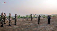 N.K. leader watches artillery firing contest
